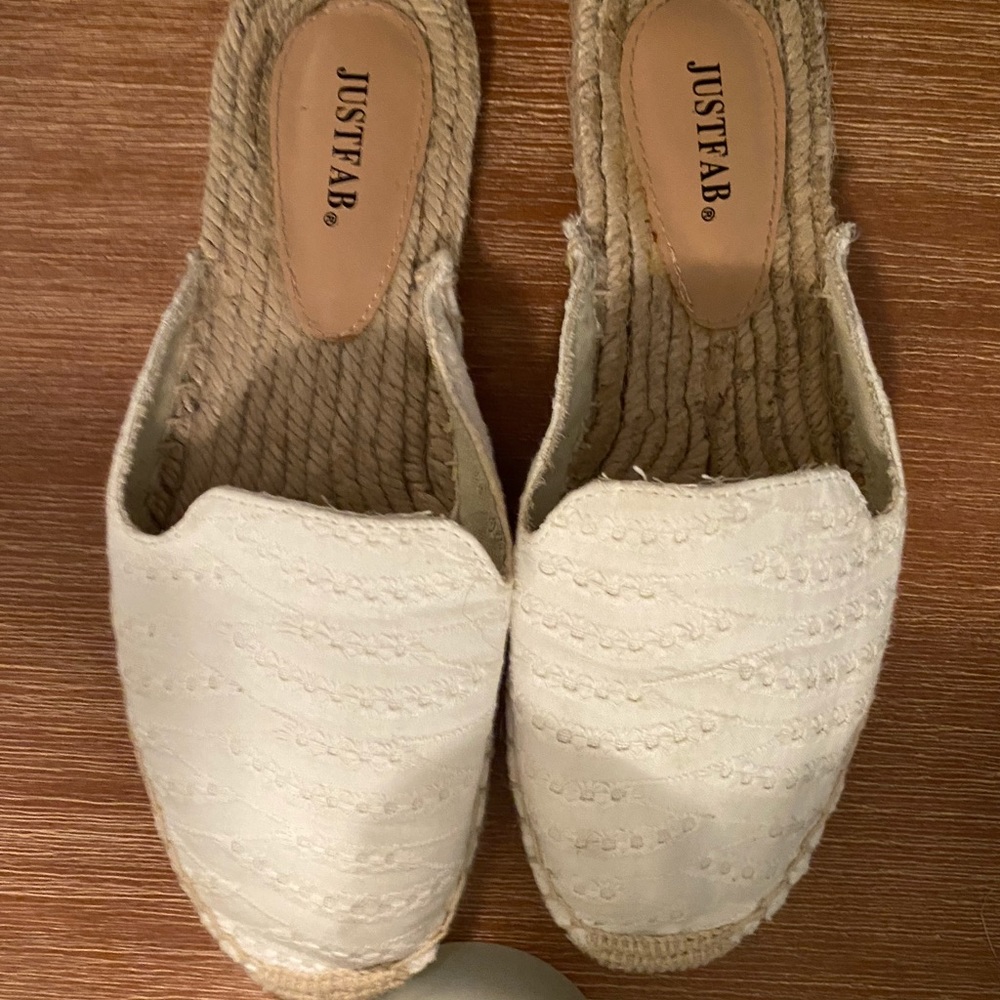 Size 7.5 slip on white and tan shoes. Just Fab